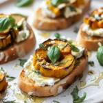 Bruschetta de courge rôtie et ricotta sur assiette, servie dans une cuisine maison