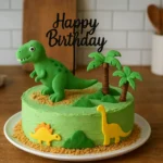 gateau dinosaure facile pour anniversaire enfant avec décoration dinosaures et topper, gâteau maison vert décoré en cuisine réelle